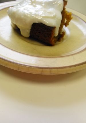 A picture of Pumpkin Brownies with Cream Cheese Frosting.