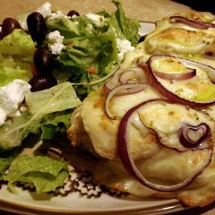 A picture of French bread chicken alfredo pizzas.