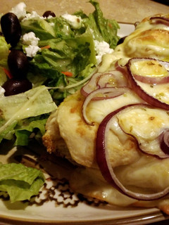 A picture of French bread chicken alfredo pizzas.