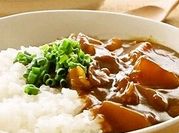 A picture of vegetable curry with rice