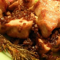 A picture of Pork Roast with Herbs Served with Balsamic Sauce.