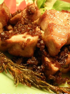 A picture of Pork Roast with Herbs Served with Balsamic Sauce.