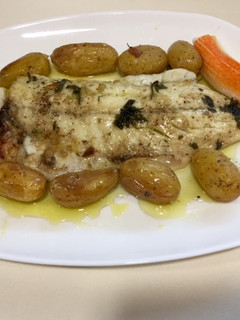 Una foto de Lubina en salsa verde