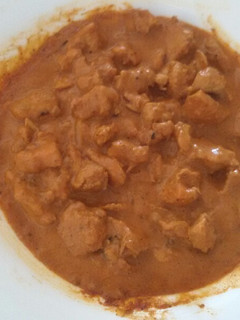 Una foto de Pollo a la mantequilla estilo hindú