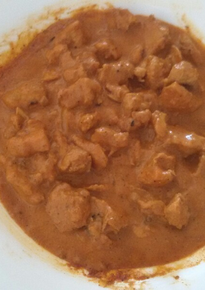 Una foto de Pollo a la mantequilla estilo hindú