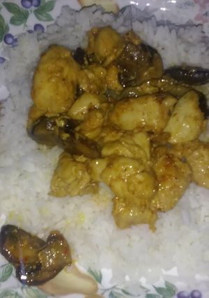 A picture of Sweet n sour chicken and mushrooms.
