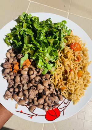 A picture of Noodles with beans.