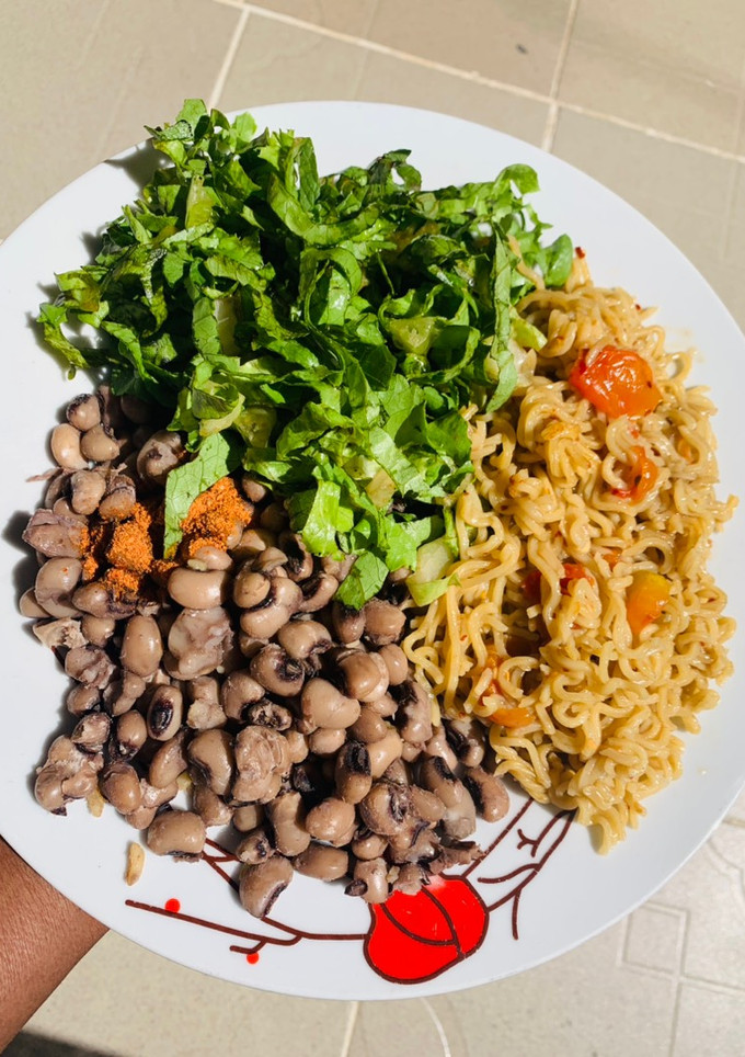 A picture of Noodles with beans.