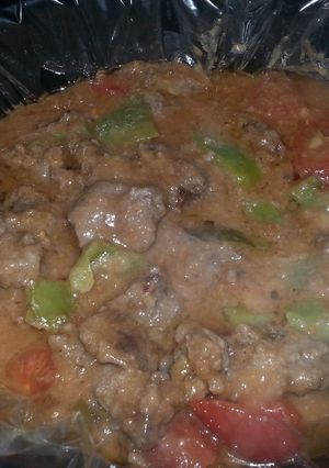 A picture of Pepper steak in a crock pot.
