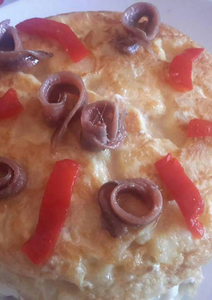 Una foto de Tortilla de patatas rellenas