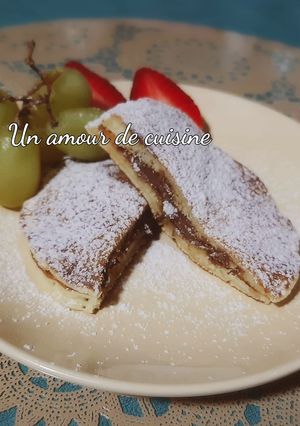 Une photo de Pancakes fourrés de pâte a tartiner