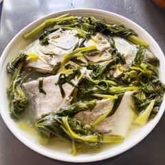A picture of Pompano Head with Kangkong.