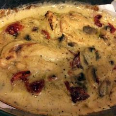 A picture of Chicken bake with mushrooms and sundried tomatos.