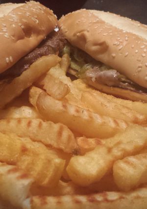 A picture of Philly cheese steak sandwiches.