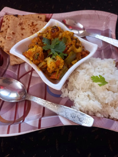 A picture of Kadhai-Style Cauliflower and Potato Curry.