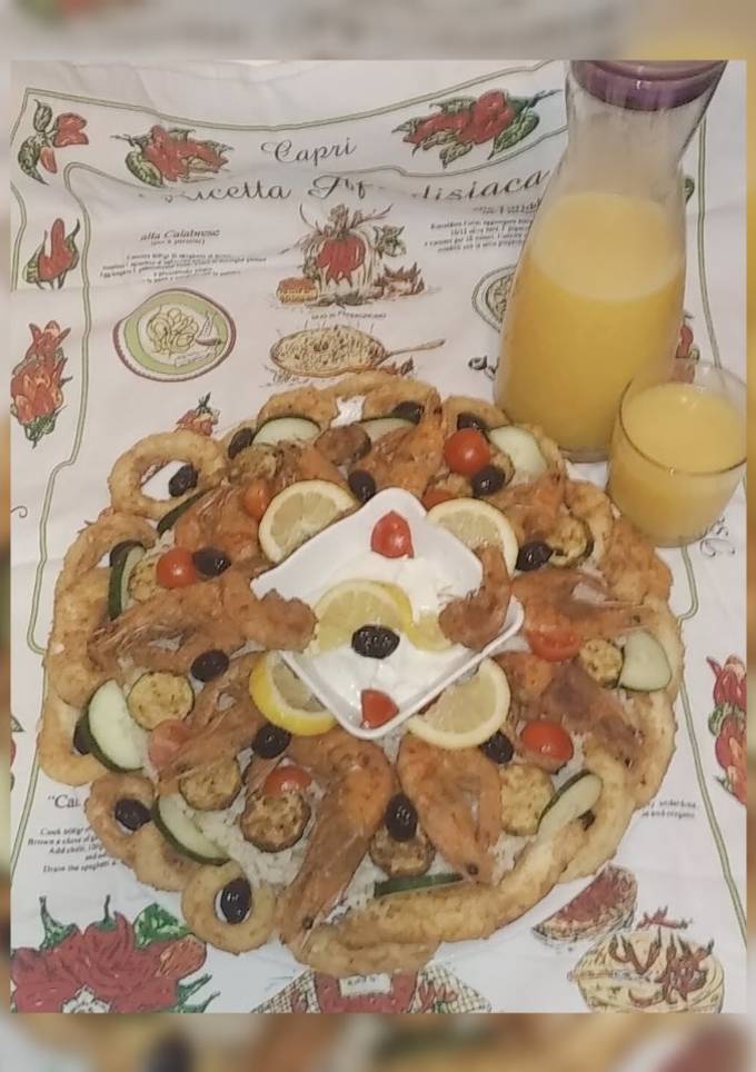 صورة طبق الرز بالكلمار والقمرون 💕
