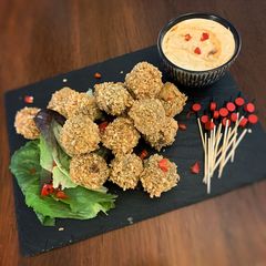 A picture of Spicy Vegetarian Haggis BitesVegan friendly too!.