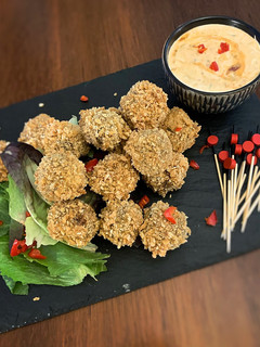 A picture of Spicy Vegetarian Haggis BitesVegan friendly too!.