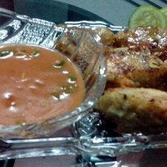 A picture of shrimp with sesame seeds & honey.