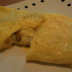 A picture of Omelet Filled with Natto, Tuna and Mayonnaise.