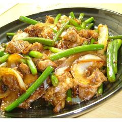 A picture of Pork & Garlic Shoots Twice-Cooked Pork-Style Fry.