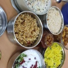 A picture of Lemon, coconut, imli, curd Rice.
