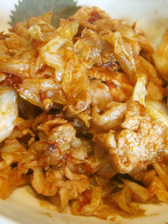 A picture of Stir Fried Cabbage and Pork with Tomato Sauce.