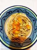 Spaghetti integrali con pomodorini gialli e philadelphia