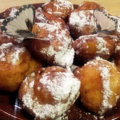 A picture of AMIEs ORANGE Ricotta Fritters.