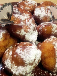 A picture of AMIEs ORANGE Ricotta Fritters.