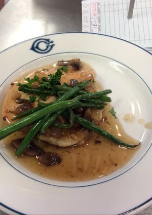 A picture of Chicken Marsala w/ Sautéed Garlic Green Beans.