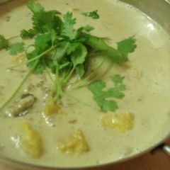 A picture of Indian Cuisine: White Fish Coconut Curry.
