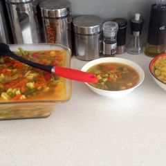 A picture of vegetables with curry rice.