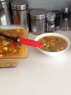 A picture of vegetables with curry rice.