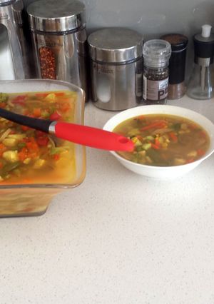 A picture of vegetables with curry rice.