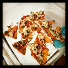 A picture of Easy peasy baked nachos.