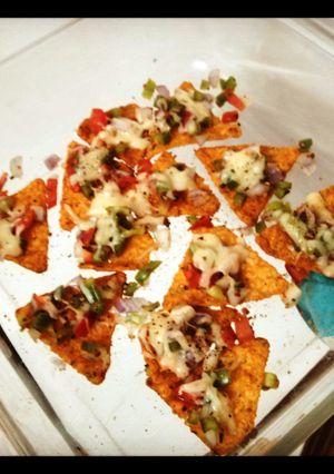 A picture of Easy peasy baked nachos.