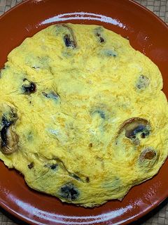 Una foto de Tortilla de champiñones