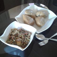 A picture of Moimoi with cabbage,fish and egg source.