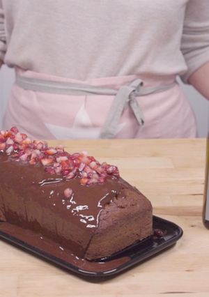 A picture of Yogurt pound cake with chocolate and extra virgin olive oil icing.