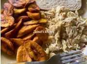 A picture of scrambled eggs and fried plantain