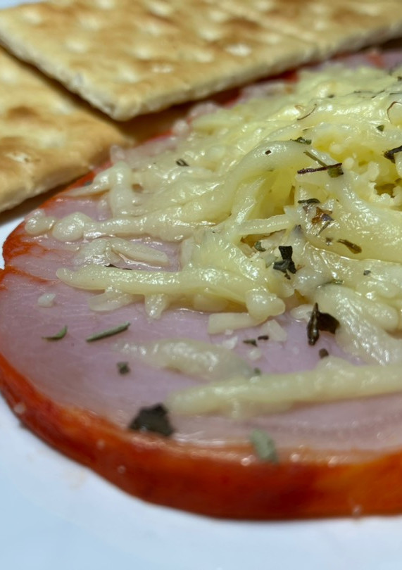 Una foto de Lomo adobado con queso mozzarella, en airfryer