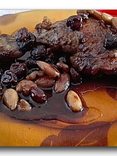 Una foto de Muslos de pollo con vinagre de módena