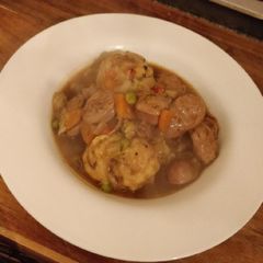 A picture of Sausage and dumpling stew.