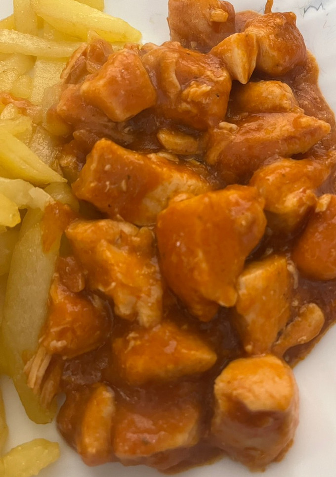 Una foto de Pollo en salsa de tomate