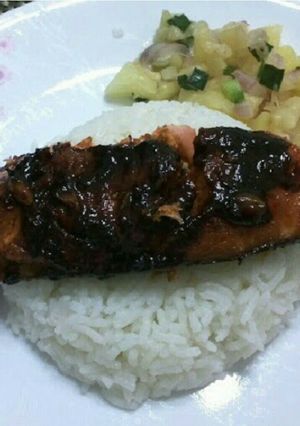 A picture of LG BAKED SALMONWITH SPICY SAUCE.