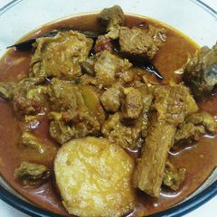 A picture of Goat Potato Curry.