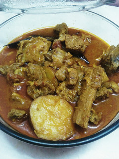 A picture of Goat Potato Curry.