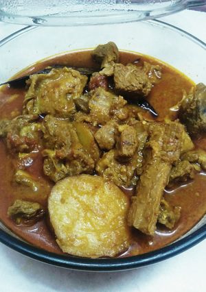 A picture of Goat Potato Curry.