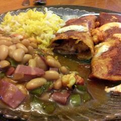 A picture of shrimp enchiladas.